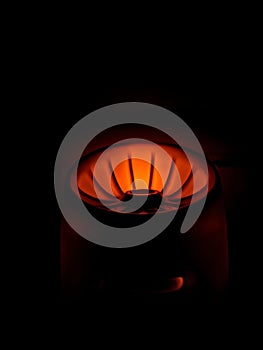 Abstract Warm Radiant Light on Black Background