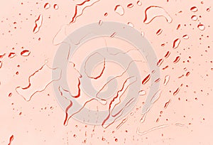 Abstract water drops on orange background