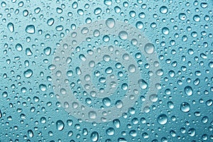 Abstract water drops on sea blue color texture background