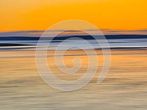 Abstract Water Nature Scene with Sunrise or Sunset in Blue and Orange