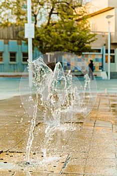 Abstract water wave drop in motion with color background.