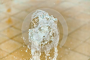 Abstract water wave drop in motion with color background.