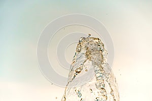 Abstract water wave drop in motion with color background.