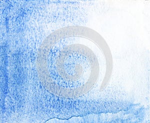 Abstract watercolor background with blue textured water paint