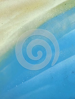 abstract watercolor on a blue background close-up, abstraction