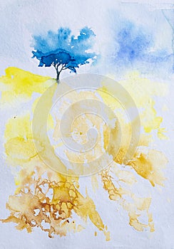 Abstract watercolor landscape, with blue color tree and yellow slope of a hill. Hand painted with watercolor paints and brush
