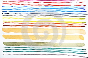 Abstract watercolor lines pattern background. Colorful watercolor painted brush strokes on white