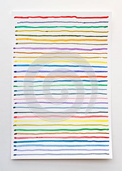 Abstract watercolor lines pattern background. Colorful watercolor painted brush strokes on white paper
