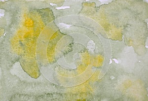 Abstract watercolor painted background with green and yellow colors
