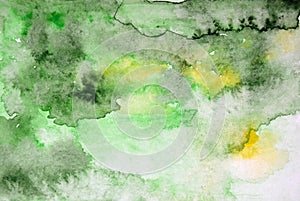 Abstract watercolor painted background with green and yellow colors