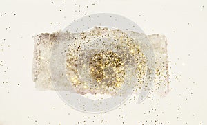 Abstract watercolor splash and gold glitter in vintage nostalgic colors.
