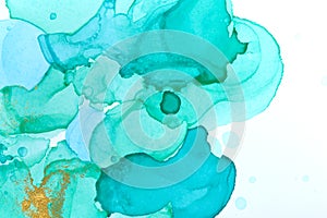 Abstract watercolor transparent drops background. Green, blue and golden glitter texture.