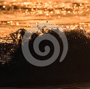 Abstract wave action at sunset