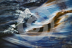Abstract wave on the autumn river