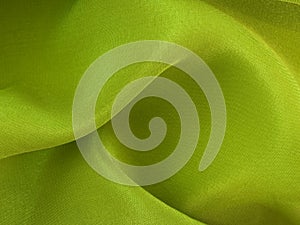 Abstract waved green silk fabric texture