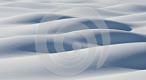 Abstract waves of pristine snow and blue shadows