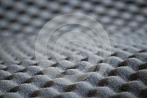 Abstract wavy texture of grey soundproof acoustic foam
