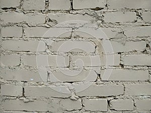 Abstract weathered texture stained old stucco light gray and aged paint white brick wall background in rural room