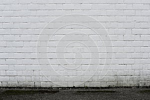 Abstract weathered textured white brick wall background