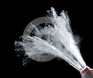 abstract white baby talcum powder explosions isolated on black b