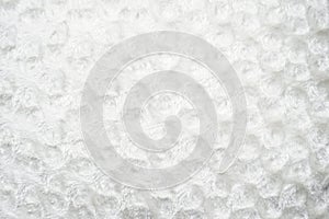 Abstract white background of fleecy fabric with circles