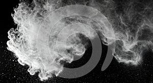Abstract White Cloud of Powder Floating on Dark Background