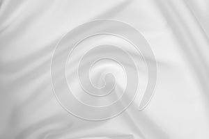 Abstract white fabric texture background. Cloth soft wave. Creases of satin, silk, and cotton.