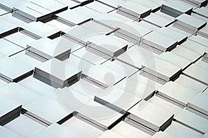 Abstract white gray metal mirrored wall, 3D metal futuristic surface, modern building design