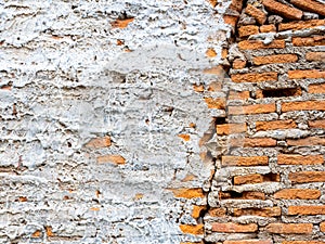 Abstract white grunge peeling cement texture on brick wall background. Old crack plaster concrete wall.