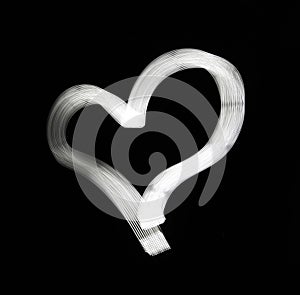 Abstract white heart on black background