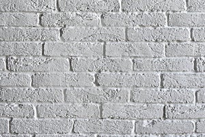 Abstract white painted decorative brick wall