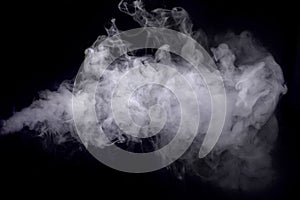 Abstract white smoke against dark background