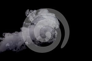 Abstract white smoke against dark background