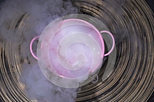 Abstract white smoke from dry ice in the pinky bowl photo