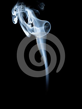 Abstract white smoke swirls on black background.