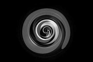 Abstract white vortex or water ring on black background