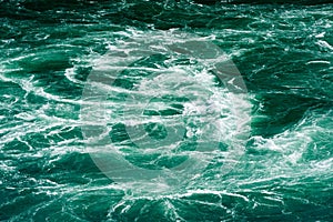 Abstract white water currents in green river