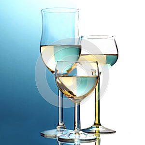Abstract wine glasses, background half blue, half white