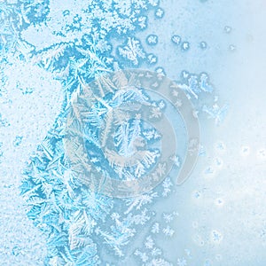 Abstract winter ice texture on window, festive background, close