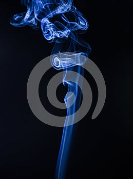Abstract wisp background. blue smoke spiraled. Fiery steam. Vapor flow. Vapour. Vaporizing. photo