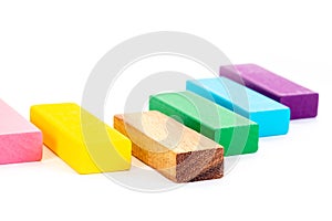 Abstract wooden block on white background. Symbol of leadership, teamwork and different. Business and design concept