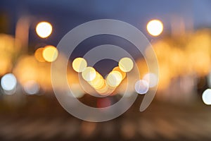 Abstract yellow bokeh light background of street night