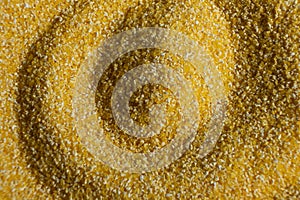 Abstract Yellow Cooking Corn Grits Background.