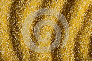 Abstract Yellow Cooking Corn Grits Background.
