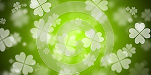 Abstract yellow green background with flying four leaf clovers