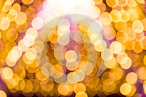 Abstract yellow holiday lights blur for festive background