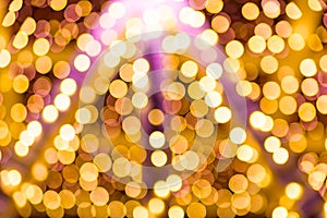 Abstract yellow holiday lights blur for festive background