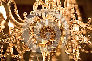 Abstract yellow luxury crystal chandelier. Vintage