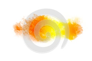 Abstract yellow orange powder explosion on white background. Freeze motion of yellow dust particles splash