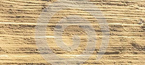 Abstract yellow sand background with layers.